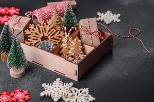 Christmas toys and decorations on a dark concrete background photo