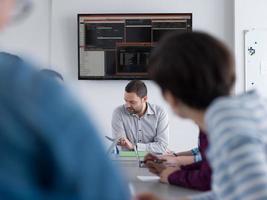 Business Team At A Meeting at modern office building photo