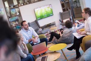 Startup Business Team At A Meeting at modern office building photo
