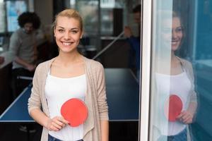 startup business team playing ping pong tennis photo