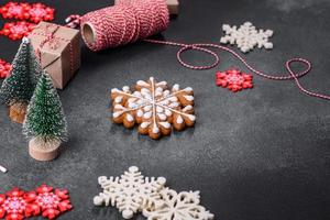 Christmas toys and decorations on a dark concrete background photo