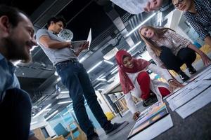 black muslim woman having meeting with Multiethnic  startup business team photo