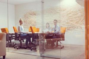 Business Team At A Meeting at modern office building photo