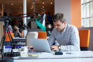 startup business, software developer working on computer photo