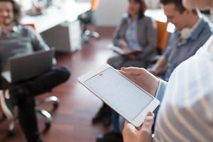 Businesswoman using tablet photo