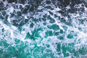 sea waves of green water top view photo