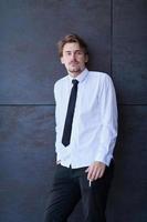 portrait of startup businessman in a white shirt with a tie photo