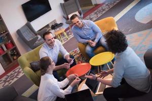 Startup Business Team At A Meeting at modern office building photo