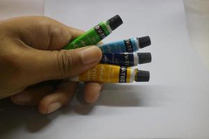 Semarang Indonesia, November 22, 2021 Colorful acrylic paint on white background photo