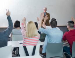Raising hands in class photo