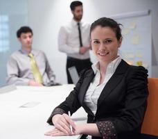 young business woman on meeting  using laptop computer photo