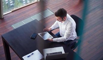 top view of young business man at office photo
