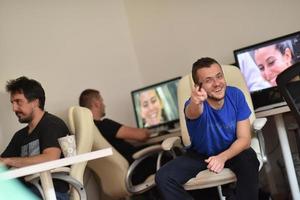 a group of graphic designers at work photo
