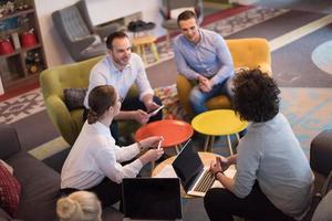 Startup Business Team At A Meeting at modern office building photo