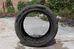 Unused used car tires with black texture, taken with creative angles photo