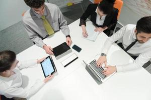 aerial view of business people group brainstorming on meeting photo