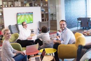 Startup Business Team At A Meeting at modern office building photo