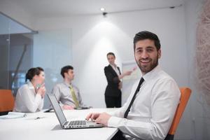 young business man at meeting photo