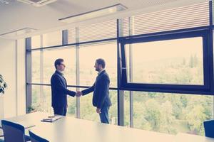 cloasing the deal in modern office interior photo