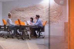 Business Team At A Meeting at modern office building photo