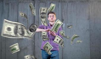 businessman making the rain of money photo