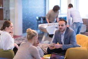 Startup Business Team At A Meeting at modern office building photo