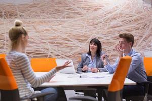 Business Team At A Meeting at modern office building photo