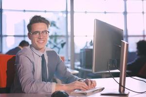 businessman working using a computer in startup office photo