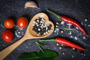 food plate herbs and spices with pepper chili tomato garlic for cooking thai asian food top view photo