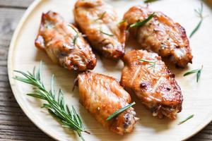 Baked chicken wings with sauce and herbs and spices cooking thai asian food rosemary chicken grilled photo