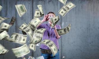 businessman making the rain of money photo