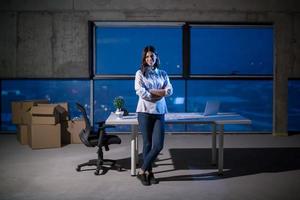 young female architect and engineer on construction site photo