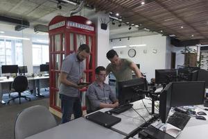 startup business people group working as team to find solution photo