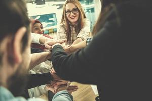 multiethnic Group of young business people celebrating success photo