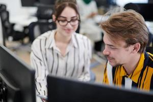 business couple working together on project photo