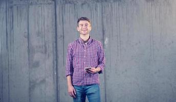 business man displaying a spread of american dollar cash money photo