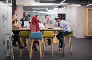 Young Multiethnic Business team using virtual reality headset photo