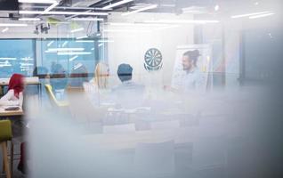 Multiethnic startup business team having meeting photo