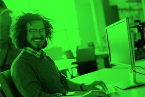 businessman working using a computer in startup office photo