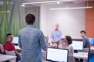 student answering a question in classroom photo