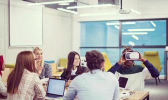 Young Multiethnic Business team using virtual reality headset photo