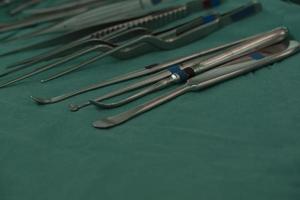 Set of surgical instruments on the table photo