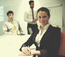 young business woman on meeting  using laptop computer photo