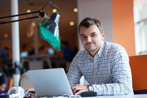 startup business, software developer working on computer photo