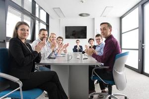 Group of young people meeting in startup office photo