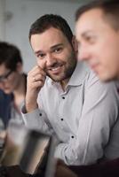 Business Team At A Meeting at modern office building photo