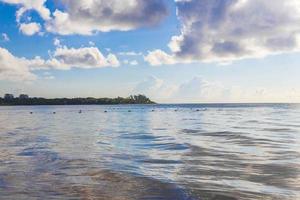 Tropical mexican beach clear turquoise water Playa del Carmen Mexico. photo