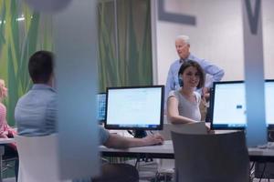 technology students group working in computer lab school  classroom photo