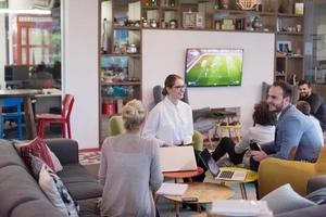 Startup Business Team At A Meeting at modern office building photo