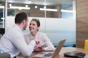 Business People Working With Tablet in startup office photo